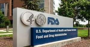 Exterior sign for the U.S. Department of Health and Human Services, Food and Drug Administration, with the agency seals on the left.